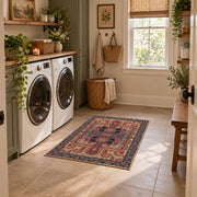 terracotta and blue distressed tribal pattern area rug, ornamental detail view