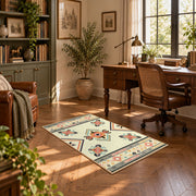cream and multicolor folk botanical pattern area rug, complete product view