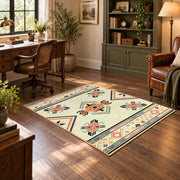 cream and multicolor folk botanical pattern area rug, soft surface detail