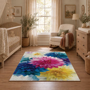 bright multicolor watercolor flower blossoms area rug, angled room view