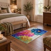bright multicolor watercolor flower blossom area rug, cozy home setting