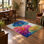 bright multicolor watercolor flower blossom area rug, wood floor styling