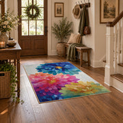 bright multicolor watercolor flower blossom area rug, close decorative detail