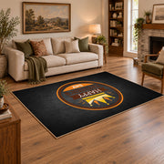black and orange vintage sports badge design area rug, angled room view