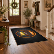 black and orange vintage sports badge design area rug, close decorative detail