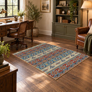 orange and blue distressed tribal pattern area rug, soft surface detail