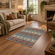 orange and blue distressed tribal pattern area rug, ornamental detail view