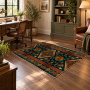 dark teal and orange tribal geometric pattern area rug, wood floor styling