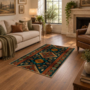 dark teal and orange tribal geometric pattern area rug, ornamental detail view