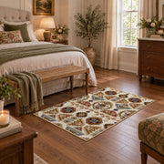 cream and brown floral mosaic tile pattern area rug, cozy home setting