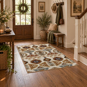 cream and brown floral mosaic tile pattern area rug, wood floor styling