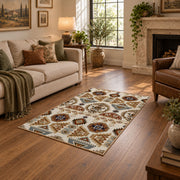 cream and brown floral mosaic tile pattern area rug, ornamental detail view