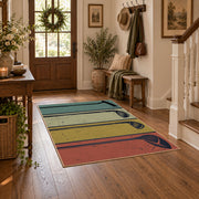 muted teal and tan retro bowling lane design area rug, close decorative detail