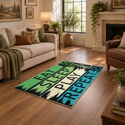green blue eat sleep play repeat typography area rug, cozy home setting