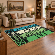 green blue eat sleep play repeat typography area rug, angled room view