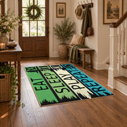 green blue eat sleep play repeat typography area rug, close decorative detail