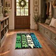 green blue eat sleep play repeat typography area rug, wide interior view