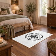 white wander compass hiking quote area rug, cozy home setting