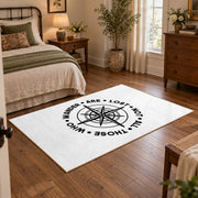 white wander compass hiking quote area rug, full pattern view
