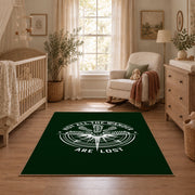 dark green compass wander quote area rug, full pattern view