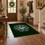 dark green compass wander quote area rug, wood floor styling