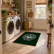 dark green compass wander quote area rug, wide interior view