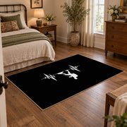 black minimalist hiker heartbeat silhouette area rug, soft surface detail