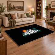 black sunset mountain adventure area rug, angled room view