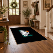 black sunset mountain adventure area rug, close decorative detail