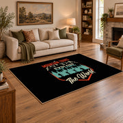 black teal mountain wonder quote area rug, angled room view