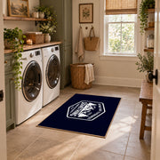 navy white mountain adventure badge area rug, featured room view