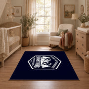 navy white mountain adventure badge area rug, full pattern view