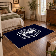 navy white mountain adventure badge area rug, soft surface detail