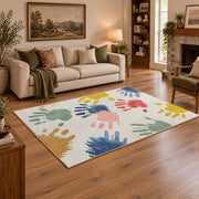 white pastel handprint art area rug, angled room view
