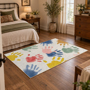 white pastel handprint art area rug, soft surface detail