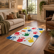 white rainbow colorful handprint area rug, cozy home setting
