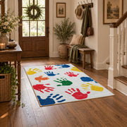 white rainbow colorful handprint area rug, close decorative detail