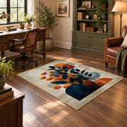 cream blue orange modern botanical abstract area rug, wood floor styling