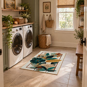 cream teal tropical leaf geometric area rug, design detail view