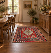 red navy Persian floral medallion traditional area rug, close decorative detail