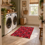 red tribal geometric Persian traditional area rug, wide interior view