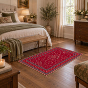 crimson Persian floral traditional border area rug, cozy home setting