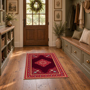 ruby red Persian panel traditional vintage area rug, front room mockup