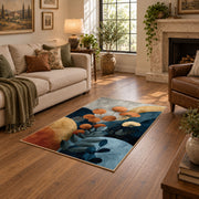 cream blue orange botanical pebble modern area rug, cozy home setting
