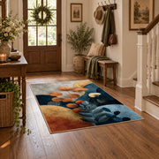 cream blue orange botanical pebble modern area rug, close decorative detail