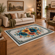 white blue orange watercolor floral border area rug, angled room view