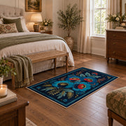navy blue red folk floral traditional area rug, cozy home setting