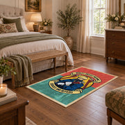 Vintage biker badge area rug in coral and teal with a motorcycle-inspired design, cozy home setting