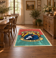 Vintage biker badge area rug in coral and teal with a motorcycle-inspired design, close decorative detail