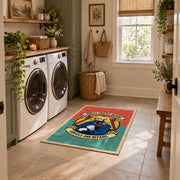 Vintage biker badge area rug in coral and teal with a motorcycle-inspired design, wide interior view